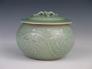 Chinese celadon porcelain jar with lid.