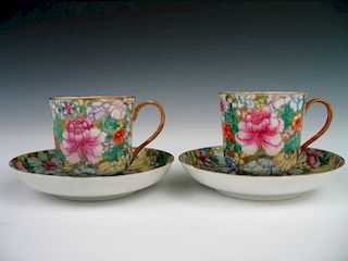 Pair Chinese famille rose porcelain cups and saucers, Qianlong mark.