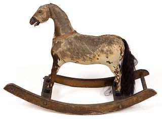 CARVED AND PAINTED ROCKING HORSE