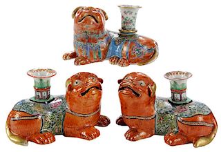 Pair Chinese Export Fu Dog Candlesticks with Another