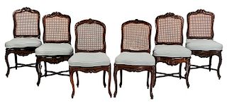 Assembled set of Six Carved and Caned Side Chairs