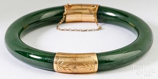 Nephrite jade bangle bracelet with 14k yellow gold
