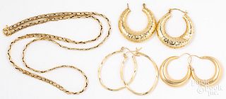 Three pairs of 14K gold hoop earrings, necklace