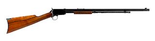 Winchester model 1890 slide action take down rifle, .22 short caliber with walnut stock and 24'' oc