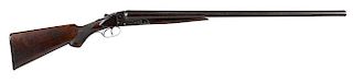 Ithaca double barrel side by side shotgun, 12 gauge with walnut stock and 30'' damascus barrels. SN