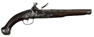 Pair of European flintlock horse pistols, approximately .75 caliber, with iron mounted relief carv