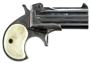 F.I.E. two barrel over/under derringer, .38 S & W caliber, nickel plated with white plastic grips