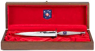 USMC commemorative fighting knife, having a polished cast on checkered panels style grip, with a d