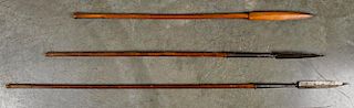 Three pointed spears, two with hand made iron blades and attached to bamboo shafts, 60'' l. and 49''