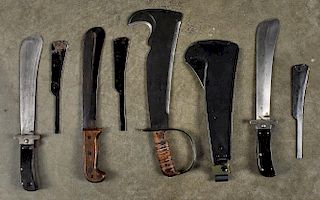 Four machetes, to include two WWII pilot survival examples, one Camillus, one Cattaraugus, togethe