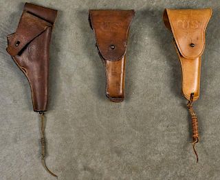 Three WW II era US Army leather holsters