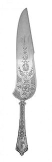 An American Silver Ice Cream Slice, Tiffany & Co., New York, Circa 1910, Persian pattern, the blade engraved with a quatrefoil o