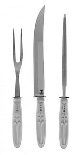 * A Silver Three-Piece Carving Set, Probably American, Mid 20th Century, handles chased with lobes and beads, comprising a carvi