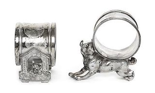 Two American Silver-Plate Figural Napkin Rings with Dogs, Late 19th Century, the first formed as a crouching terrier supporting