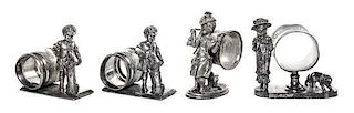 A Group of Four American Silver-Plate Figural Napkin Rings with Children and Dogs,, Various Makers, Late 19th/Early 20th Century