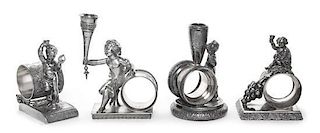 A Group of Four Figural Napkin Rings with Putti, Various Makers, Late 19th/Early 20th Century, comprising an example with a drap