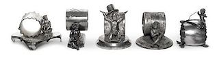 A Group of Five American Silver-Plate Figural Napkin Rings with Putti, Various Makers, Late 19th/Early 20th Century, comprising