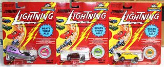 Four Boxes of Johnny Lightning Cars