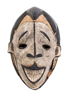 An Igbo Painted Wood Mask, NIGERIA, MID-20TH CENTURY,