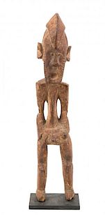 A Jukun Carved Wood Male Figure, NIGERIA,