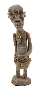 An African Carved Wood Figure, ,