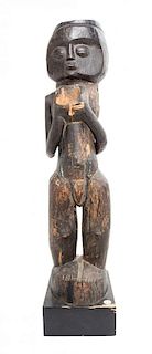 An African Carved Wood Male Figure, ,