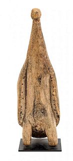 A Carved Wood Figure of a Bird, MADAGASCAR,