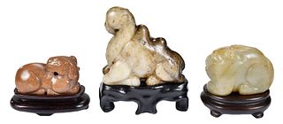 Three Carved Jade Animals with Stands