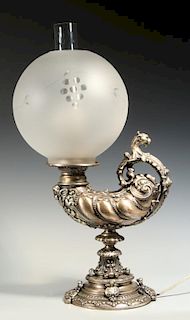 A CIRCA 1900 SILVERED GRIFFIN HARVARD LAMP