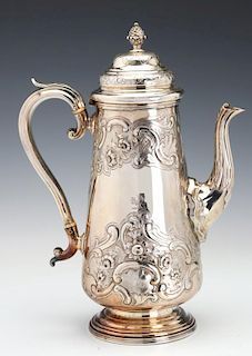 A 19TH CENTURY SILVER PLATED REPOUSEE COFFEE POT