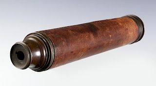 A 19TH C. TWO-DRAW BRASS TELESCOPE WITH LEATHER