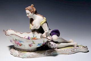 A DRESDEN FIGURAL SWEETMEAT WITH RESTORATION