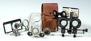 A COLLECTION OF HAND HELD STEREO VIEWERS