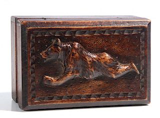 A CIRCA 1900 BLACK FOREST PUZZLE BOX WITH BEAR