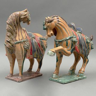 PAR DE CABALLOS,  ORIGEN ORIENTAL, SIGLO XX. Estilo Tang, elaborados en cerámica policromada. Acabado vidriado. 2 piezas.