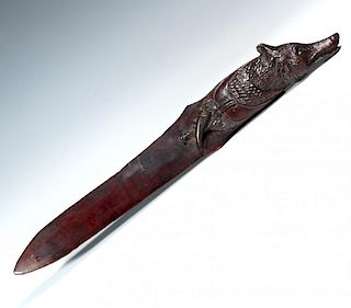 A BLACK FOREST CARVED WOOD WOLF'S HEAD LETTER OPENER