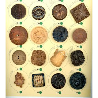 A card of assorted wood buttons including animals.