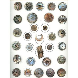 A card of assorted shaded mother of pearl buttons