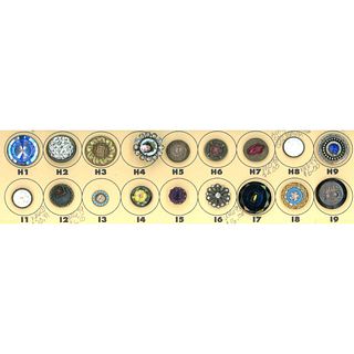 A small card of assorted waistcoat style buttons