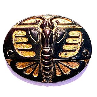 A division three black glass insect button