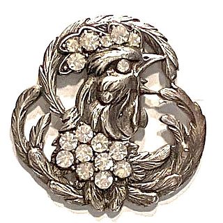 A division one pierced metal and paste rooster button