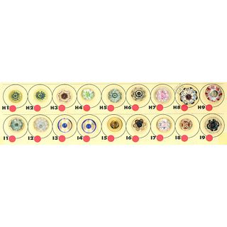 A partial card of division one glass buttons