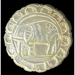 A division 3 carved pearl button from Jerusalem