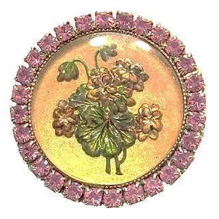 A division three colorful under glass pictorial button