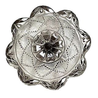 A division one silver lustered lacy glass button