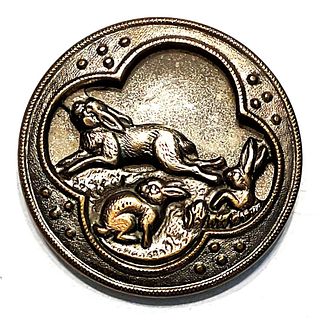 A division one brass pictorial animal button
