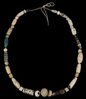 EARLY MIDDLE-EASTERN BEADS