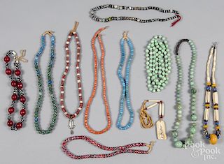 Group of eleven beaded necklaces of Chinese, Nativ