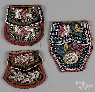 Three Iroquois beaded cloth purses, late 19th/earl