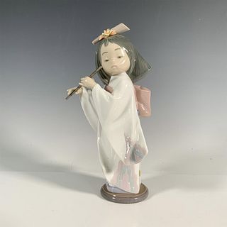 Playing The Flute 1006150 - Lladro Porcelain Figurine